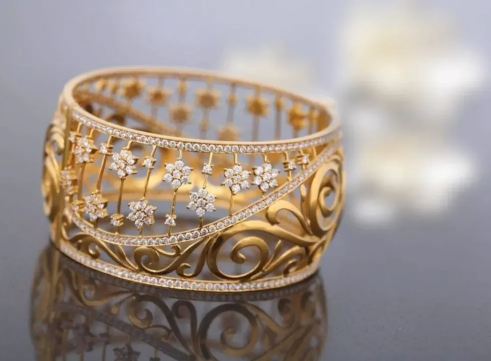 Gold and diamond fancy bangle