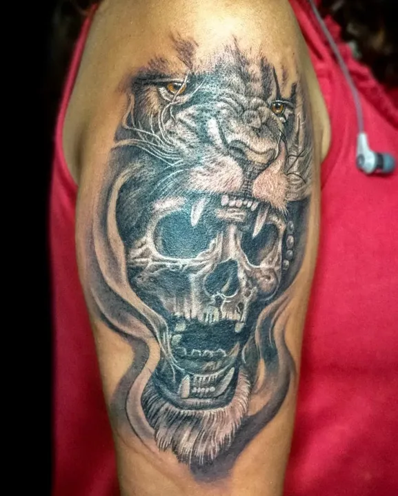 Lion & Skeleton Tattoo