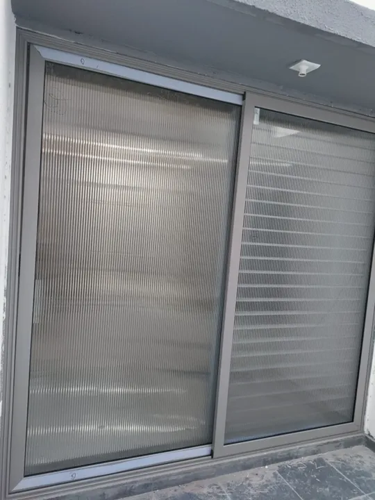 Domal sliding windows with safety grill