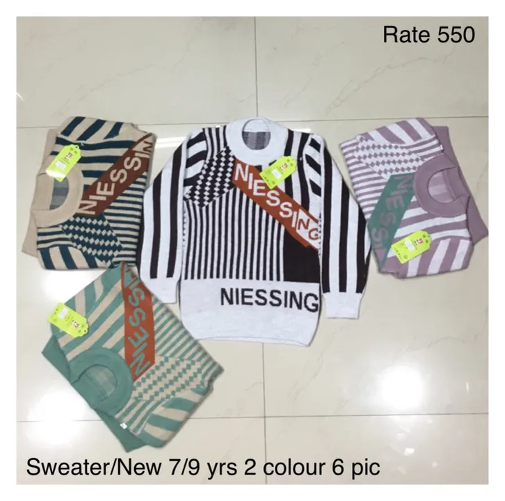 Sweater/new 7/9 yrs